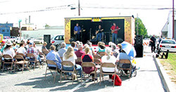 Image of Bob Christensen, Mark Dodge, Roger Ludwick, and Kevin Miller at the Stanwood-Camano Music Festival show, Sept. 7, 2002